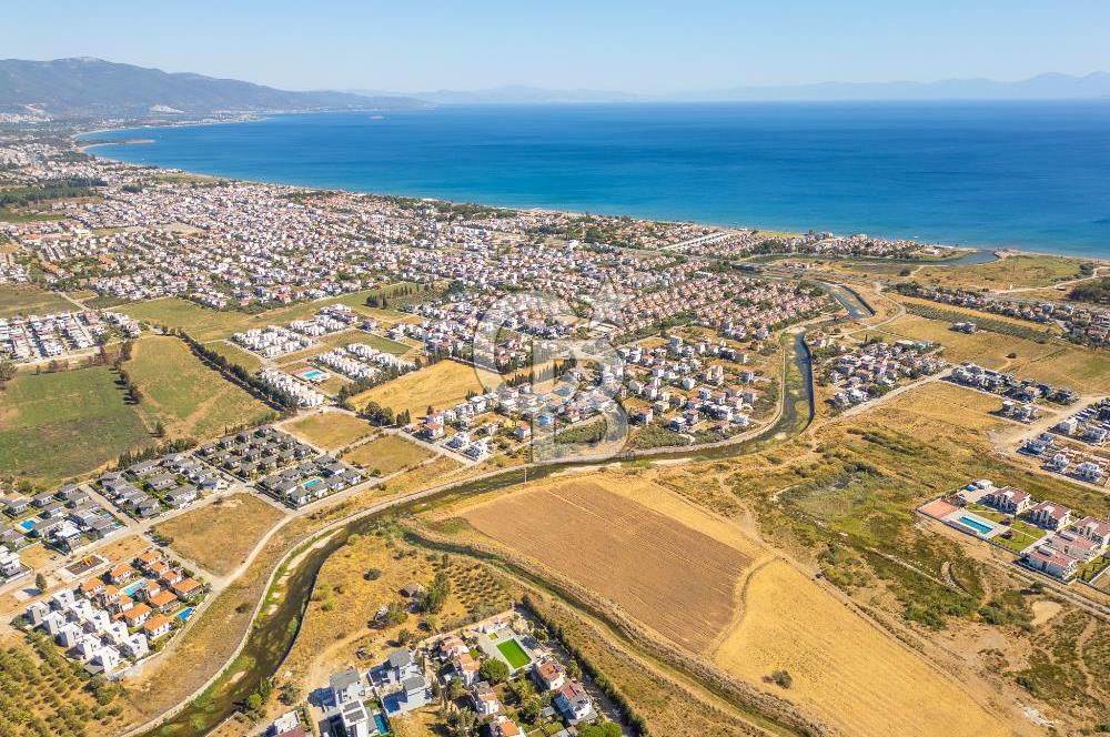 SEFERİHİSAR DOĞANBEY TURİZM İMARLI 8.670 M2 ARSA