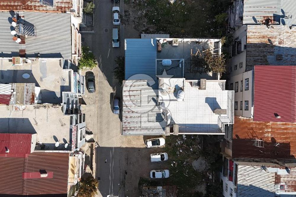 Buca’da Konut ve Dükkandan Oluşan Komple Satılık Bina 
