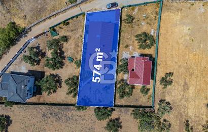ÇNAKKALE EZİNE DE SATILIKMÜSTAKİL 574 M2 ARSA İÇİNDE TAŞ EV