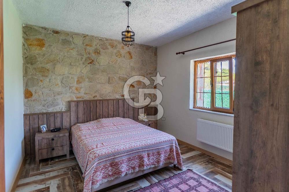 ÇNAKKALE EZİNE DE SATILIKMÜSTAKİL 574 M2 ARSA İÇİNDE TAŞ EV