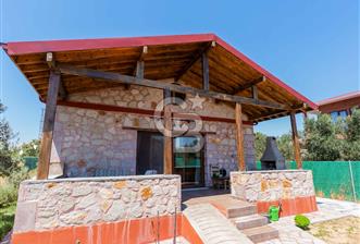 ÇNAKKALE EZİNE DE SATILIKMÜSTAKİL 574 M2 ARSA İÇİNDE TAŞ EV