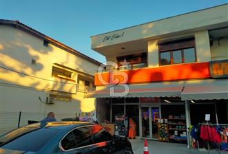 GÜZELYALI DA MİGROSUN ÜZERİNDE SATILIK 2+1 DAİRE