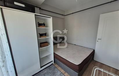 KARŞIYAKA ANADOLU CADDESİ YAKINI LÜKS BİNADA TAM EŞYALI 1+1 KİRALIK DAİRE