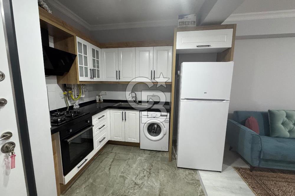 Alaybey 1+1 izban ve sahil yakını eşyalı balkonlu satılık daire