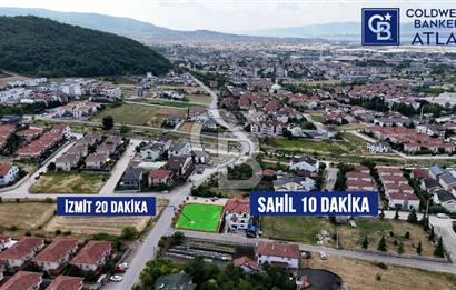 BAŞİSKELE YENİKÖY'DESATILIK 3 TARAFI YOL İMARLI ARSA