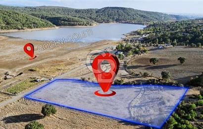 CB OPİA'DAN YATIRIMA UYGUN 7650M² TARLA - GÖĞEM GÖLETİ MANZARALI 