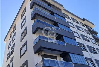 MENDERES COLDWELL BANKER POYRAZ'DAN GÜMÜLDÜR MERKEZDE SIFIR 3+1