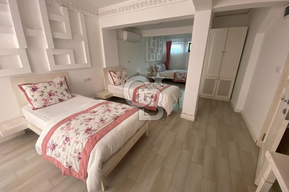 ÇANAKKALE BOZCAADA MERKEZİ KONUMDA 8 ODALI KİRALIK PANSİYON