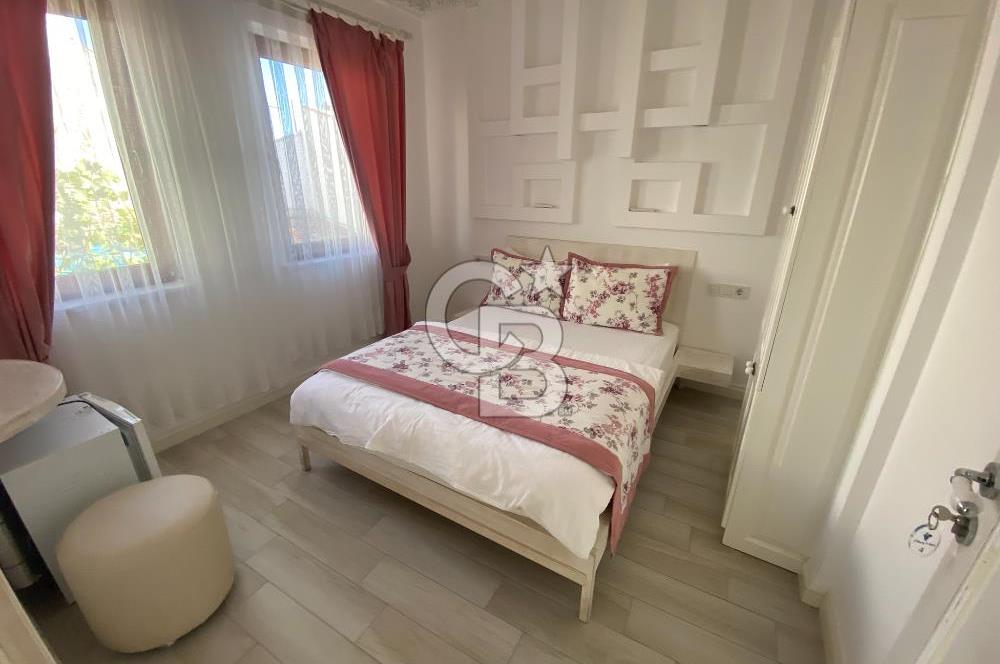 ÇANAKKALE BOZCAADA MERKEZİ KONUMDA 8 ODALI KİRALIK PANSİYON