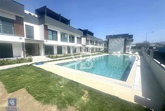Garden Bornova da 1+1 güvenlikli bahçeli havuzlu kiralık daire