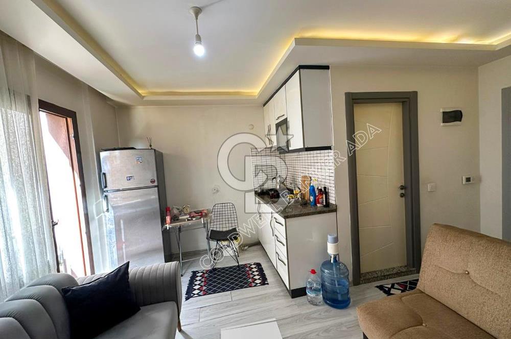 KUŞADASI SAHİLE 70 METRE MESAFEDE EŞYALI KİRALIK 1+1 DAİRE