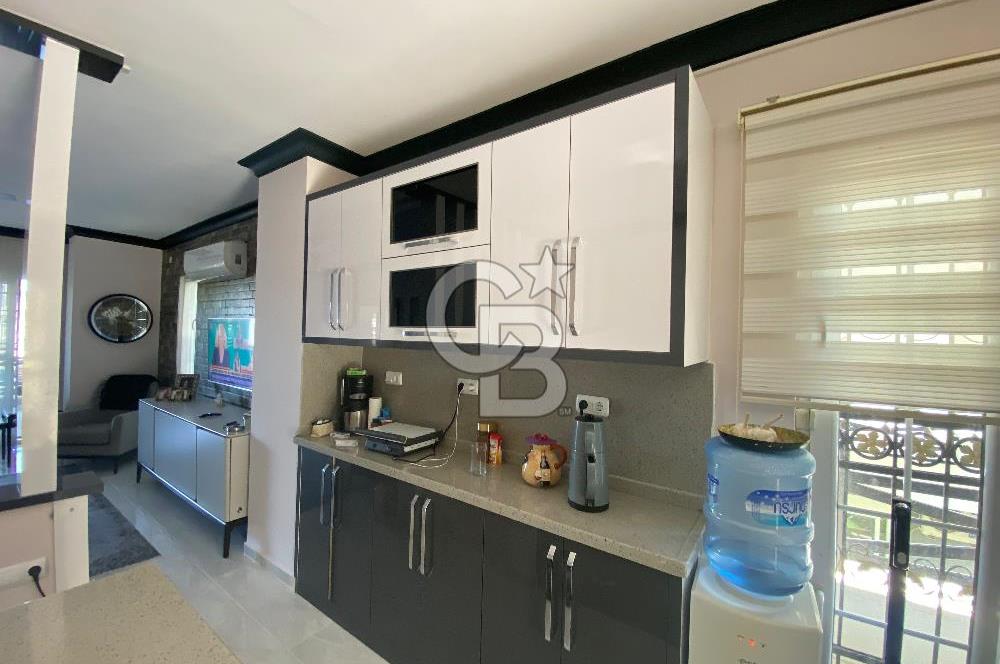 Akbükün Kalbinde,Üç Manzarayı Bir Arada Sunan 2+1 Satılık Daire