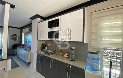 Akbükün Kalbinde,Üç Manzarayı Bir Arada Sunan 2+1 Satılık Daire