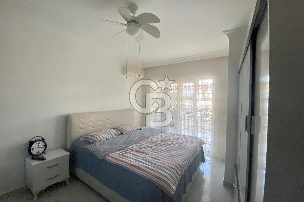 Akbükün Kalbinde,Üç Manzarayı Bir Arada Sunan 2+1 Satılık Daire