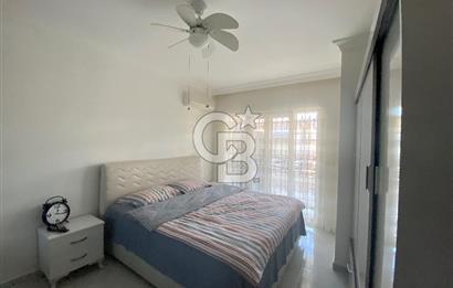 Akbükün Kalbinde,Üç Manzarayı Bir Arada Sunan 2+1 Satılık Daire