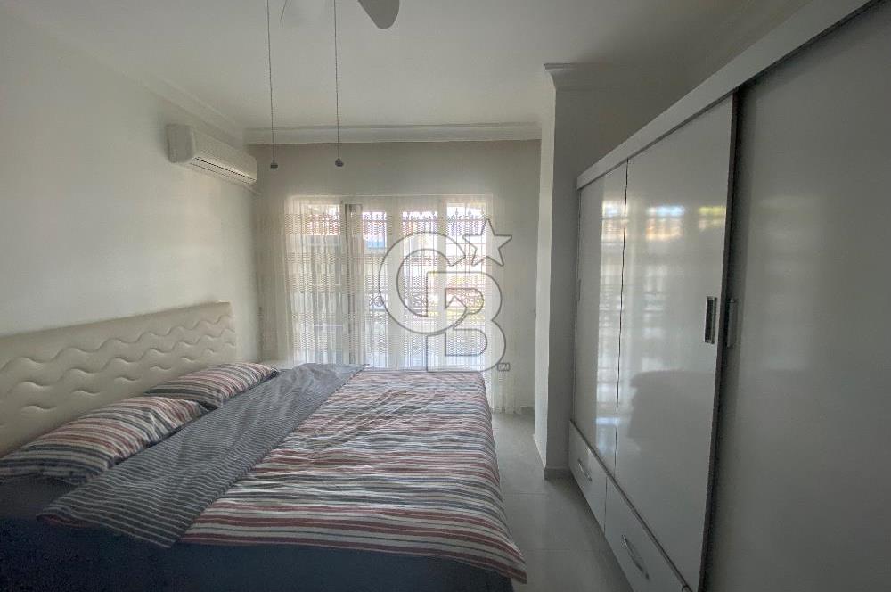 Akbükün Kalbinde,Üç Manzarayı Bir Arada Sunan 2+1 Satılık Daire