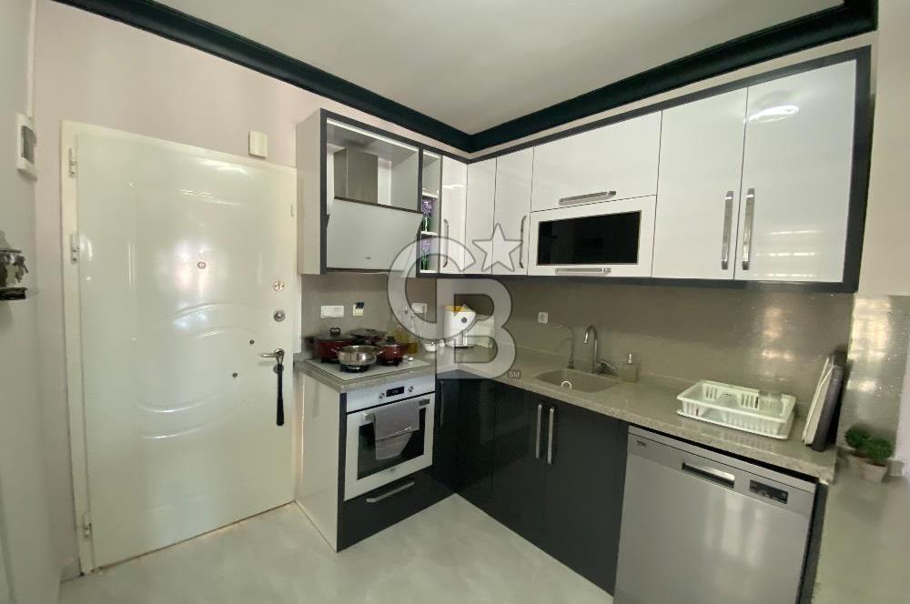 Akbükün Kalbinde,Üç Manzarayı Bir Arada Sunan 2+1 Satılık Daire