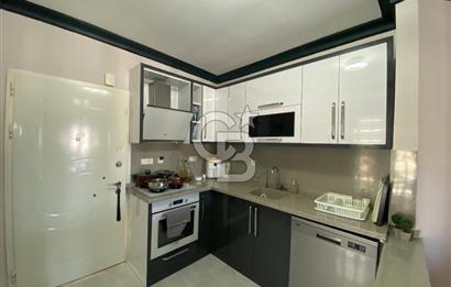 Akbükün Kalbinde,Üç Manzarayı Bir Arada Sunan 2+1 Satılık Daire