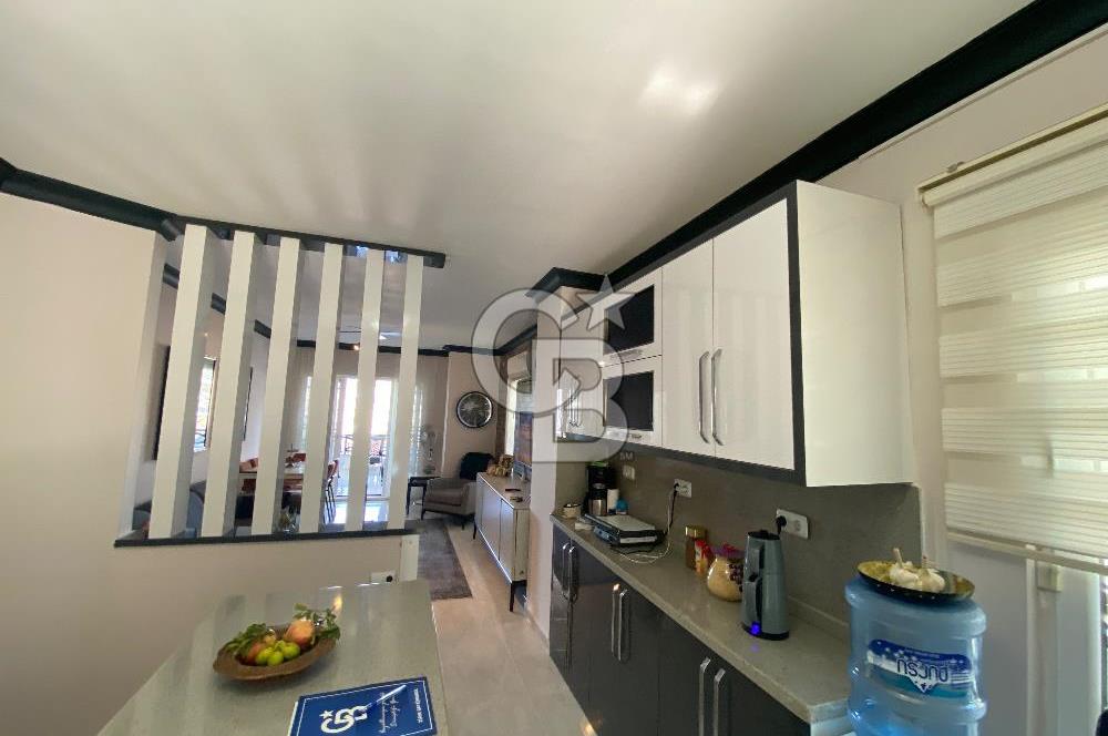 Akbükün Kalbinde,Üç Manzarayı Bir Arada Sunan 2+1 Satılık Daire