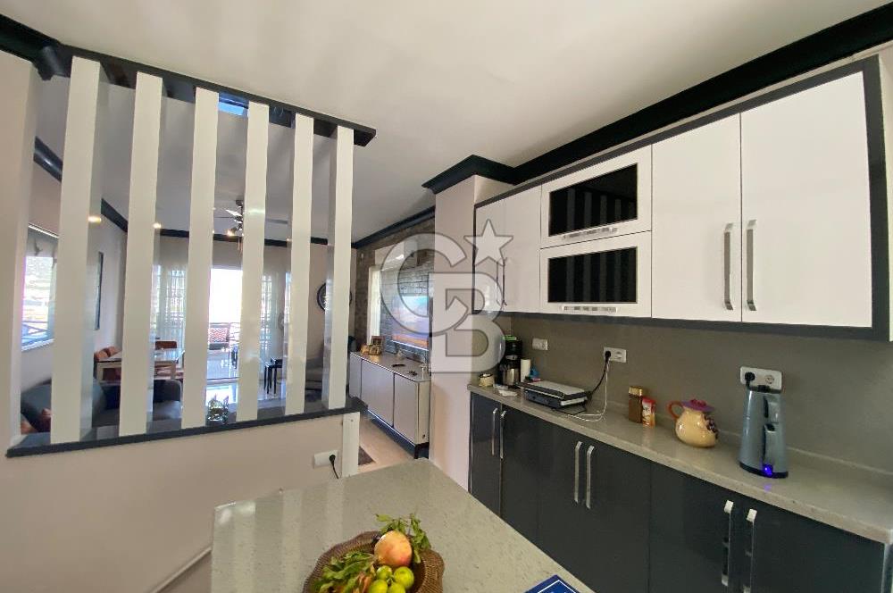 Akbükün Kalbinde,Üç Manzarayı Bir Arada Sunan 2+1 Satılık Daire