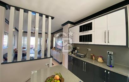 Akbükün Kalbinde,Üç Manzarayı Bir Arada Sunan 2+1 Satılık Daire