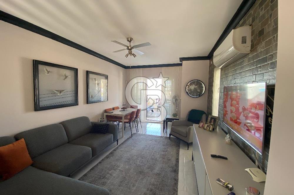 Akbükün Kalbinde,Üç Manzarayı Bir Arada Sunan 2+1 Satılık Daire