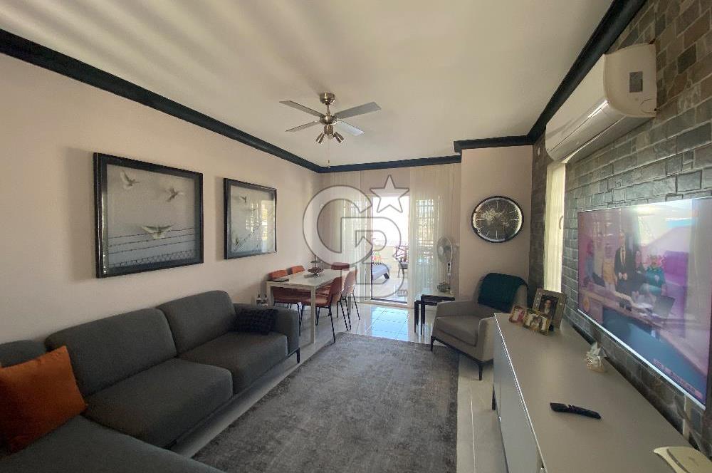 Akbükün Kalbinde,Üç Manzarayı Bir Arada Sunan 2+1 Satılık Daire