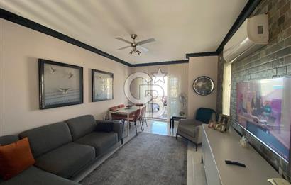 Akbükün Kalbinde,Üç Manzarayı Bir Arada Sunan 2+1 Satılık Daire