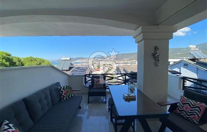 Akbükün Kalbinde,Üç Manzarayı Bir Arada Sunan 2+1 Satılık Daire