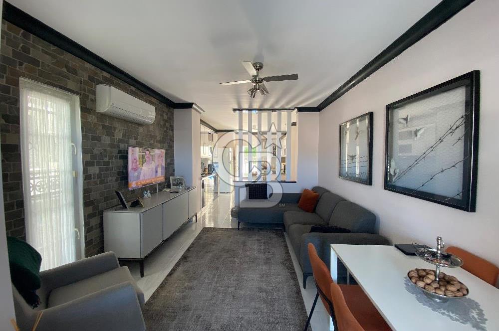 Akbükün Kalbinde,Üç Manzarayı Bir Arada Sunan 2+1 Satılık Daire