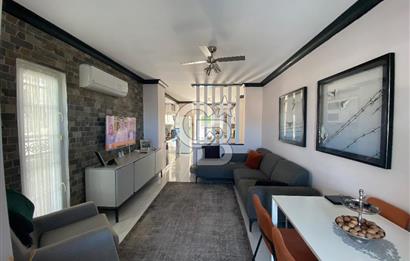 Akbükün Kalbinde,Üç Manzarayı Bir Arada Sunan 2+1 Satılık Daire