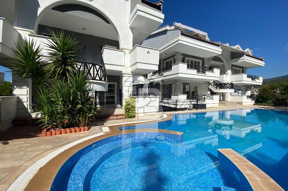 Akbükün Kalbinde,Üç Manzarayı Bir Arada Sunan 2+1 Satılık Daire