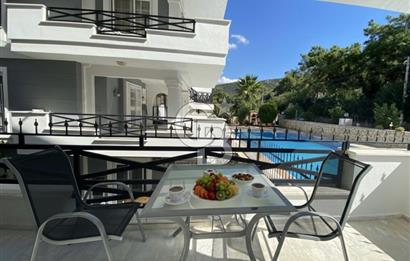 Akbükün Kalbinde,Üç Manzarayı Bir Arada Sunan 2+1 Satılık Daire