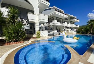 Akbükün Kalbinde,Üç Manzarayı Bir Arada Sunan 2+1 Satılık Daire - 1 - 309931