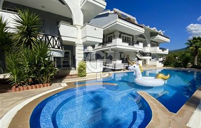 Akbükün Kalbinde,Üç Manzarayı Bir Arada Sunan 2+1 Satılık Daire