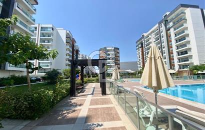 İZMİR Mavişehir MODERN 1'de HAVUZ CEPHE 1+1 EŞYALI KİRALIK DAİRE