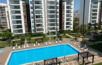 İZMİR Mavişehir MODERN 1'de HAVUZ CEPHE 1+1 EŞYALI KİRALIK DAİRE
