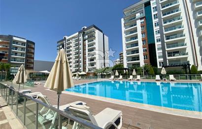 İZMİR Mavişehir MODERN 1'de HAVUZ CEPHE 1+1 EŞYALI KİRALIK DAİRE