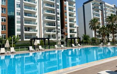 İZMİR Mavişehir MODERN 1'de HAVUZ CEPHE 1+1 EŞYALI KİRALIK DAİRE