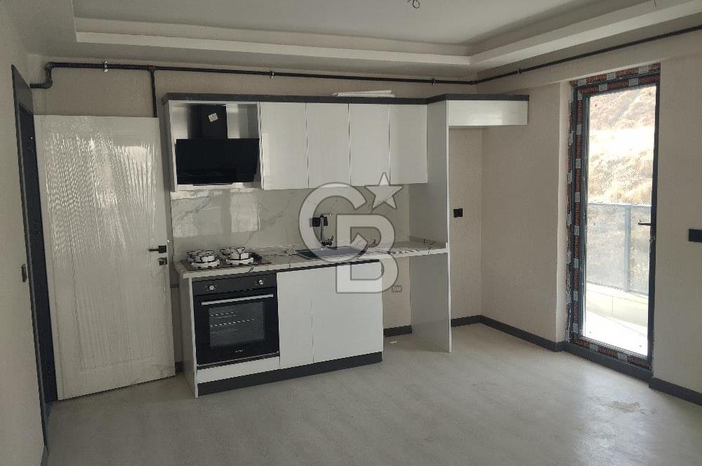 Dikmen İlker Mahallesinde Merkezi Konumda Satılık Sıfır 2+1 Daire 