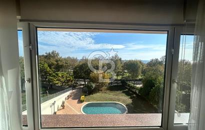 Sahil parselinde açık havuzlu ve kapalı garajlı binada 4+1daire