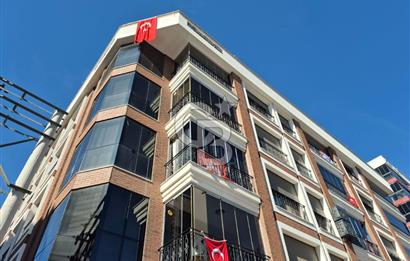 KARŞIYAKA ŞEMİKLER MERKEZ LÜKS BİNADA SATILIK DÜKKAN