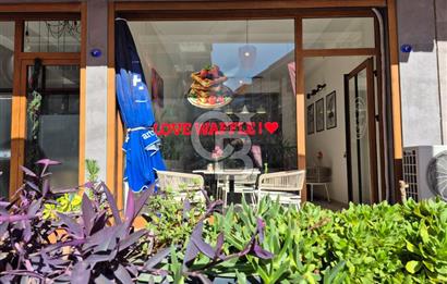 KARŞIYAKA ŞEMİKLER MERKEZ LÜKS BİNADA SATILIK DÜKKAN