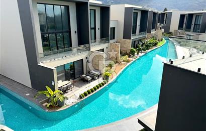 Kıbrıs Girne Kervansaray Projesi Deniz ve Havuz Manzaralı Satılık 3+1 Loft Daire