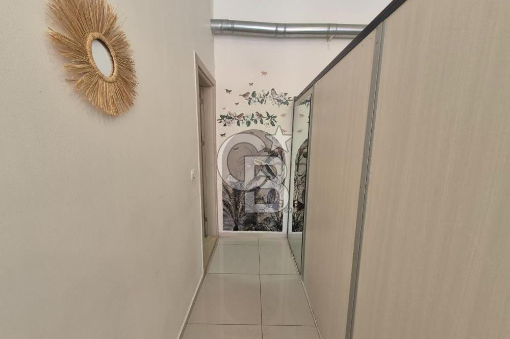 KARŞIYAKA ŞEMİKLER MERKEZ LÜKS BİNADA SATILIK DÜKKAN