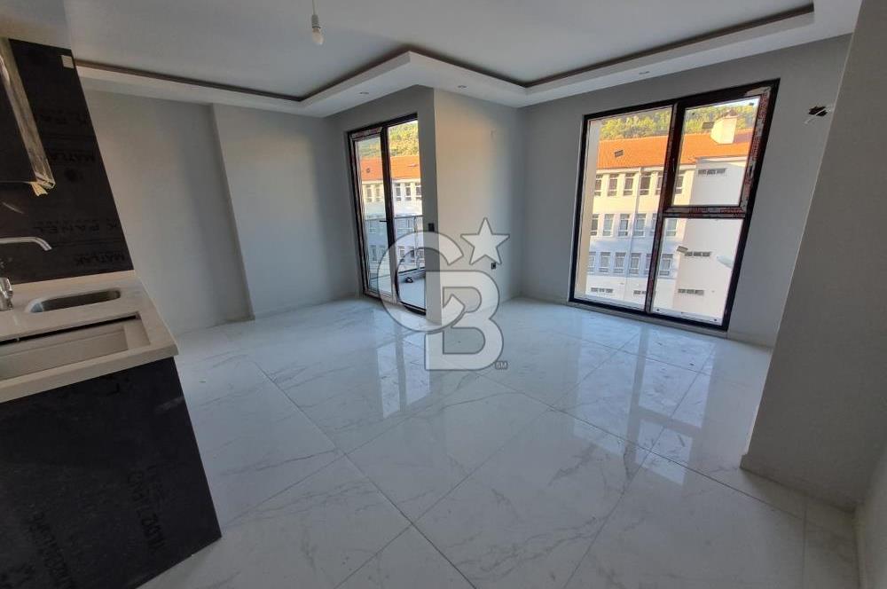 Muğla Menteşe Recai Güreli Caddesinde 2+1 Satılık İşyeri