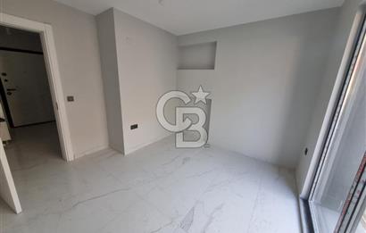 Muğla Menteşe Recai Güreli Caddesinde 2+1 Satılık İşyeri