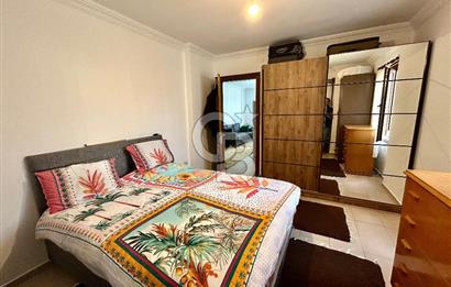 Datça — TAM MERKEZDE, BAHÇELİ & KAPALI BALKONLU 1+1 SATILIK DAİRE