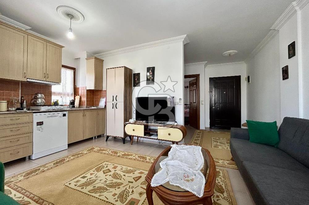 Datça — TAM MERKEZDE, BAHÇELİ & KAPALI BALKONLU 1+1 SATILIK DAİRE