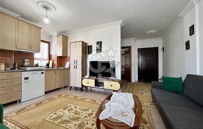 Datça — TAM MERKEZDE, BAHÇELİ & KAPALI BALKONLU 1+1 SATILIK DAİRE